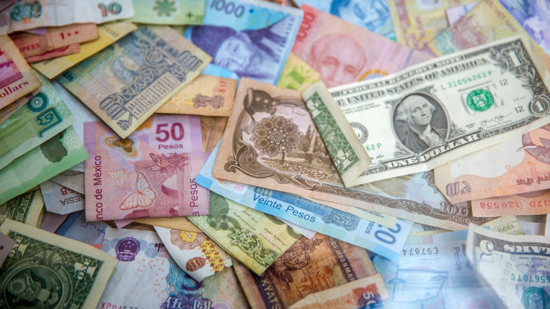 International banknotes from many countries. Photo by Jason Leung on Unsplash.