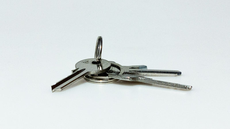 Three keys on a ring. Photo by Jozsef Hocza on Unsplash.