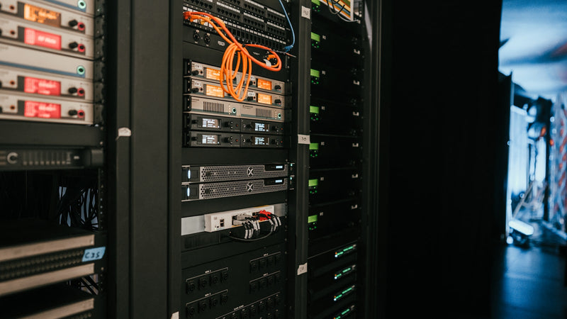 A rack of servers in a data centre. Photo by Kevin Ache on Unsplash.